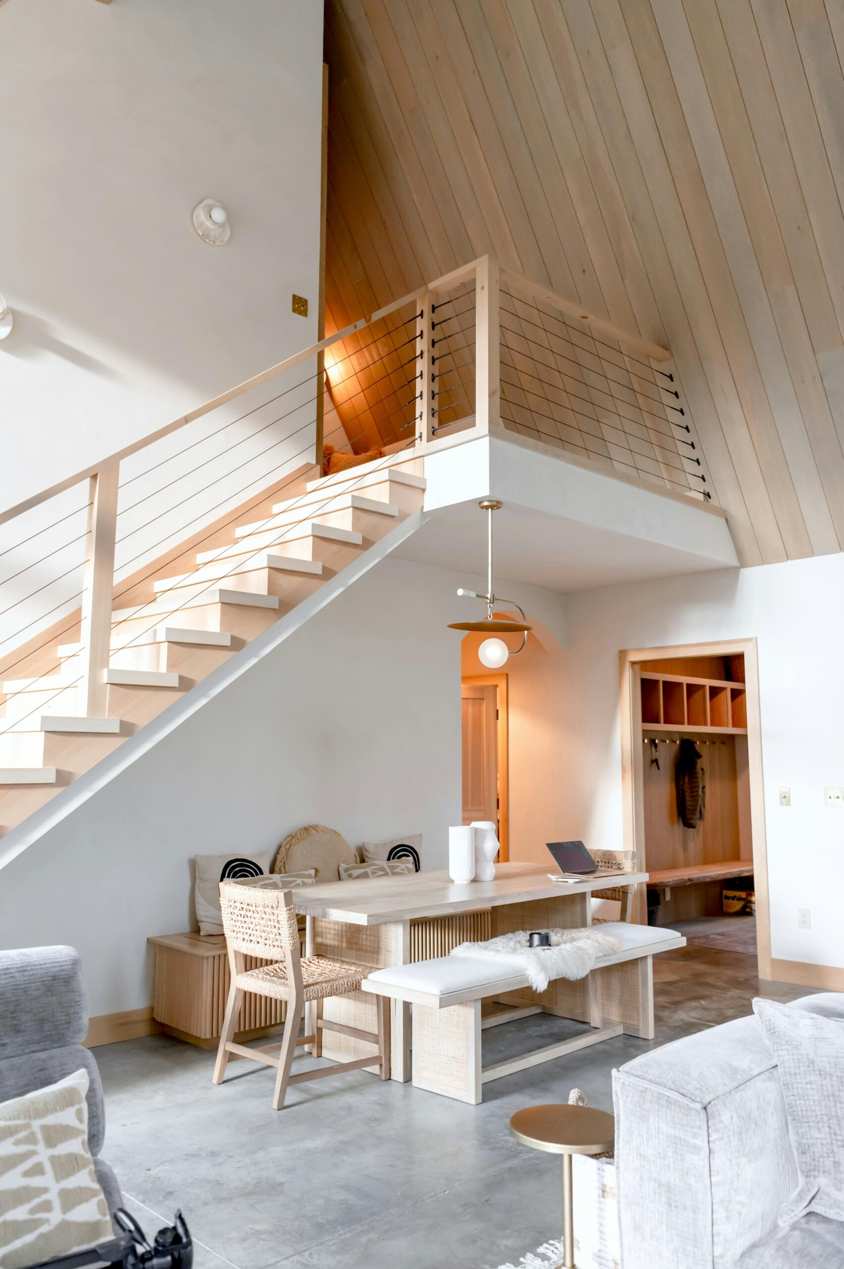 Elegant Scandinavian-style living space featuring minimalist decor and natural wood accents.