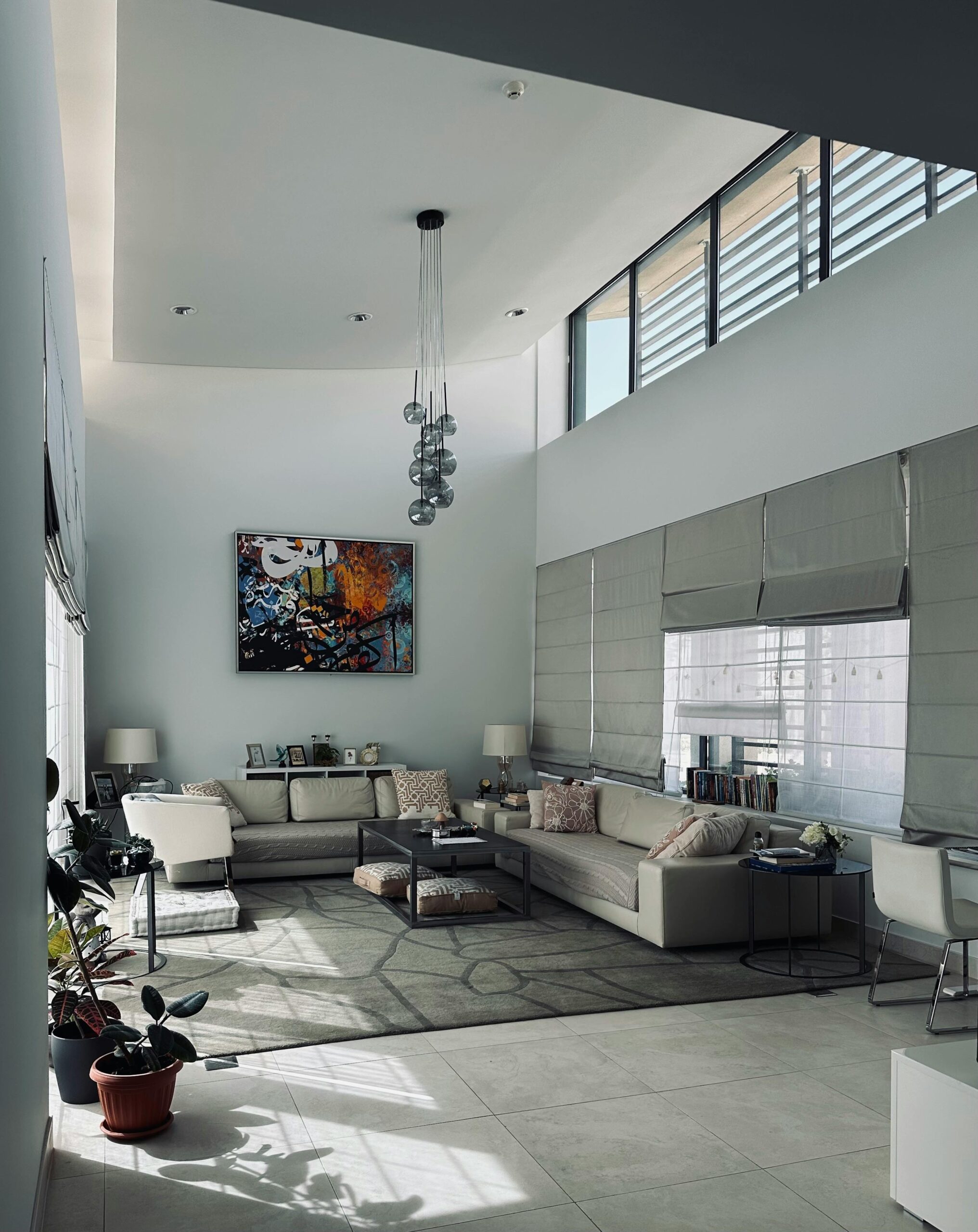 Sophisticated modern living room interior with minimalist decor and natural light ambiance.